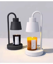Two table lamps with candles on a light gray background