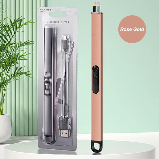 Rose gold USB BBQ lighter with packaging on a light green background