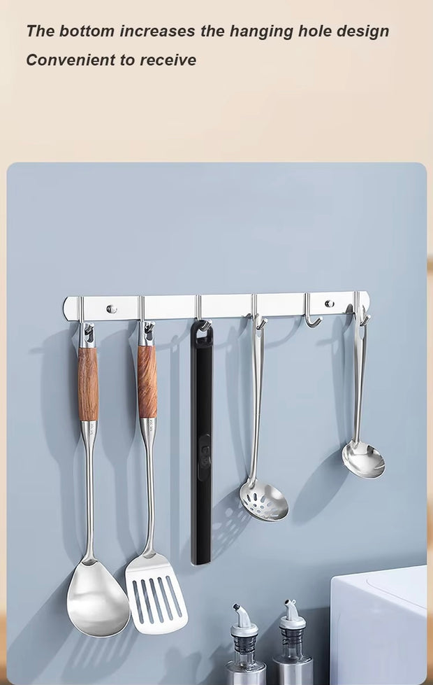 Set of kitchen utensils hanging on a magnetic strip with text about the design.