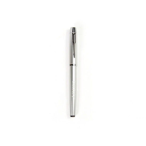 Silver pen on a white background