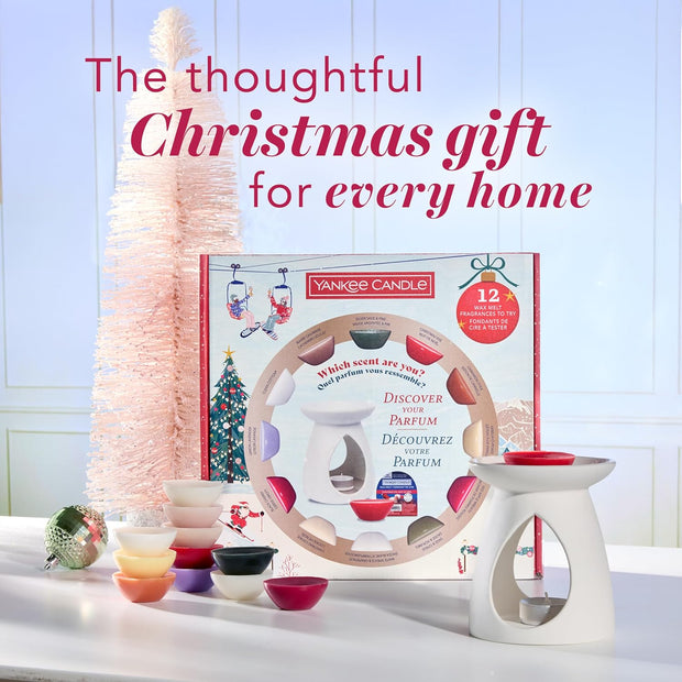 Yankee Candle product set with scented candles and diffuser on a white surface.