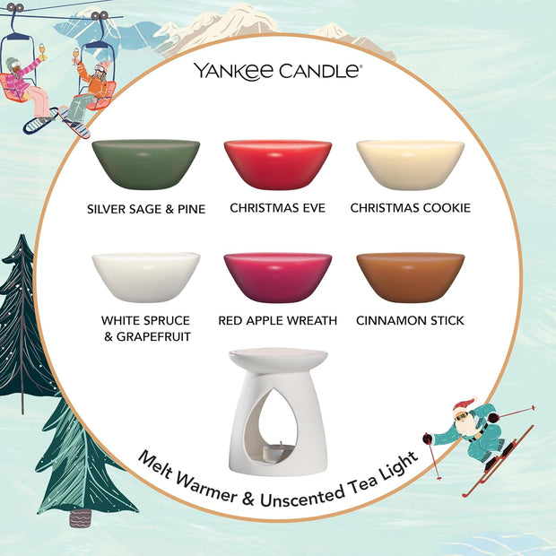 Yankee Candle product lineup with scents and a melt warmer on a festive background.