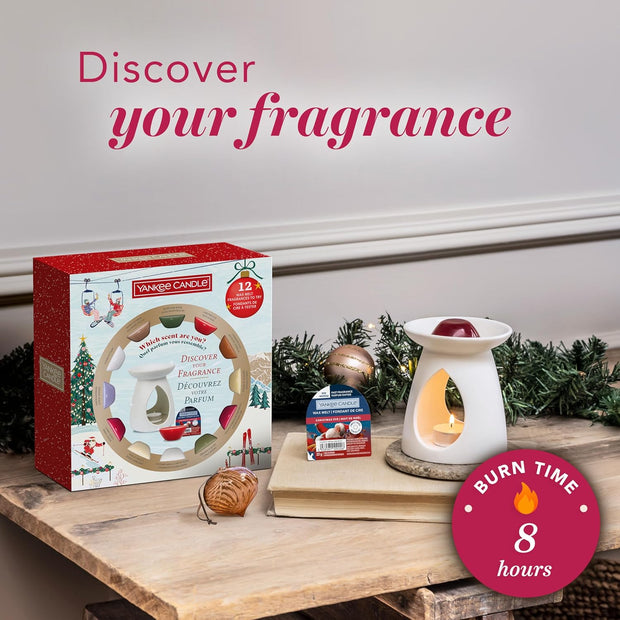 Yankee Candle product with packaging and scented wax melts on a wooden surface.