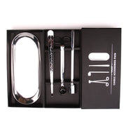 Silver candle accessories set with tools and a holder in a black box packaging.